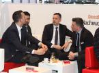 Markus Aegerter, Geschäftsleitungsmitglied des AGVS (rechts), diskutiert mit Marc Kessler, Giuseppe Chiarella und Michel Rohrer, alle von der Quality1.